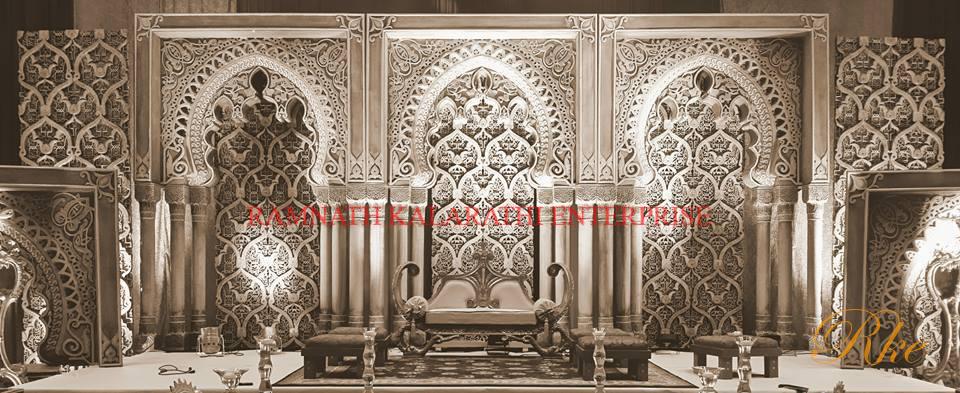wedding stage	Moroccan design stage 3 arch with 6 triple pillar set background carved panel looks nice for Muslim wedding events in stone colour shade of designing work of superior artist from india in Mumbai film industries at direction and moulding design  