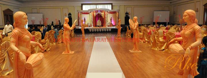 wedding jaimala stage playing singing and dancing statues with their instruments looks beautiful sets of stage wedding events of marriage couple in stage and mandaps of venues