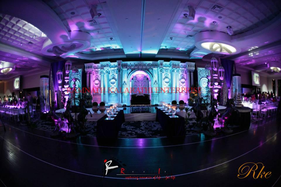 varmala stage in roman design big set white and black colour shade in black marble theme looks nice in decoration of stage in wedding event of Indian marriage bride and groom for beautiful locks of view point of wedding decorations